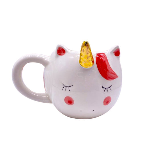 Tazza in ceramica a forma di unicorno rosa con cornetto dorato.
