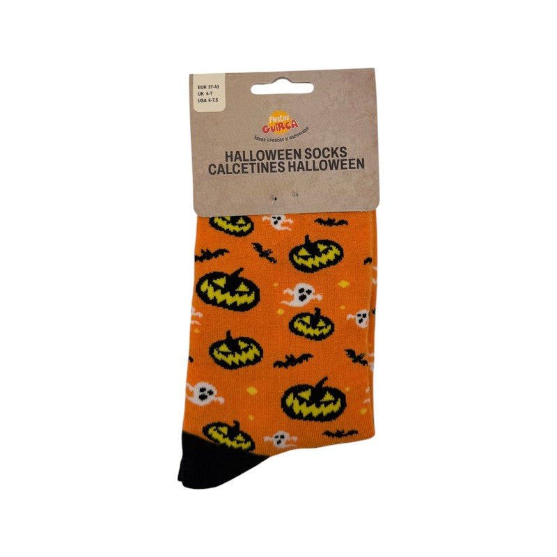 Calzini di Halloween con zucche, fantasmi e pipistrelli: calze arancioni con stampa all-over e dettagli neri, allegre e comode. Su Viano Shop!