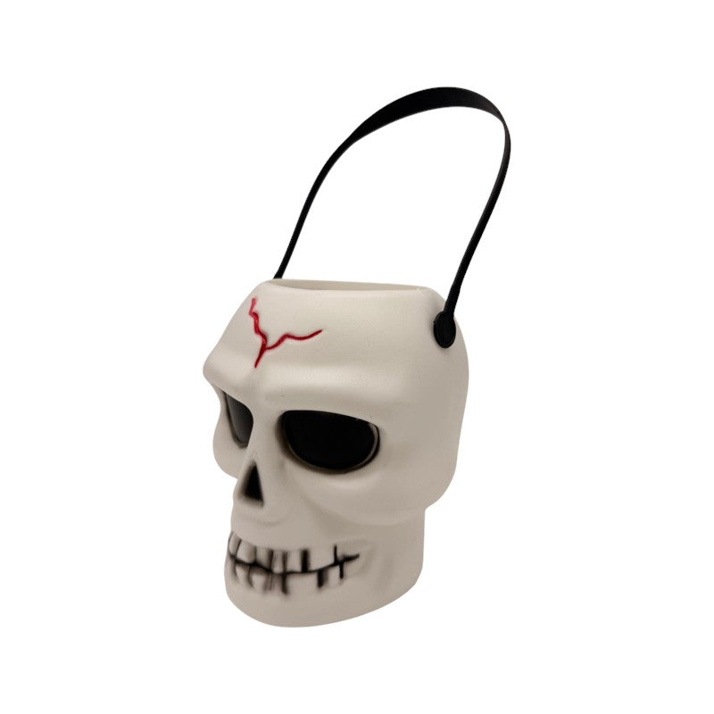 Secchiello portadolcetti di Halloween a forma di teschio con manico: cestino per caramelle e decorazione per dolcetto o scherzetto. Su Viano Shop!