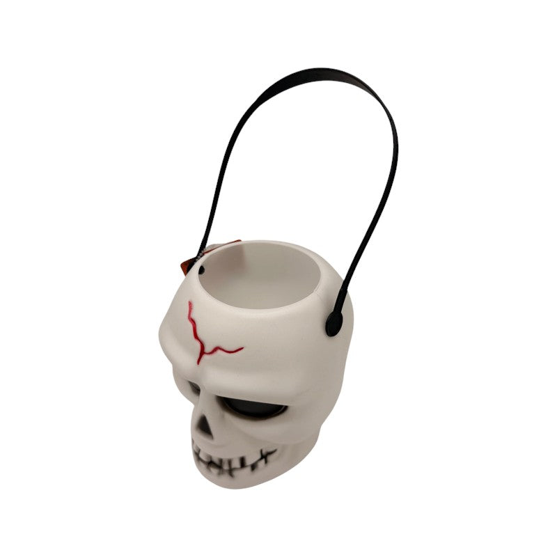 Secchiello portadolcetti di Halloween a forma di teschio con manico: cestino per caramelle e decorazione per dolcetto o scherzetto. Su Viano Shop!