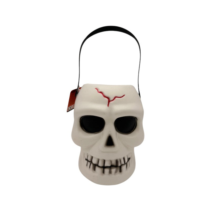 Secchiello portadolcetti di Halloween a forma di teschio con manico: cestino per caramelle e decorazione per dolcetto o scherzetto. Su Viano Shop!