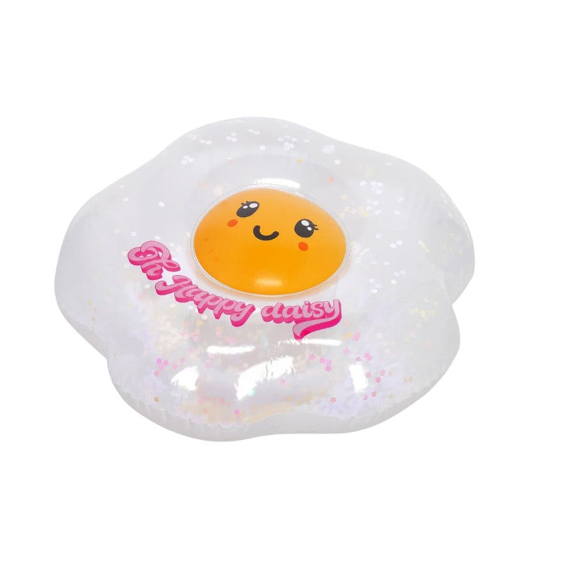 Cuscino gonfiabile Legami Oh Happy Daisy: forma margherita, PVC trasparente con glitter rosa, faccino kawaii centrale. Regalo estivo originale e scintillante!

