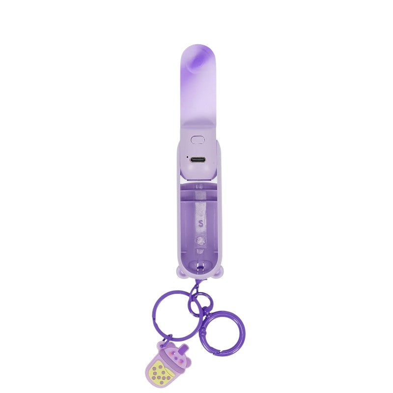 Mini fan ricaricabile Legami Teddy Bear: 3 velocità, luce LED, portachiavi, USB Type-C incluso, 87g. Design orsetto kawaii lilla. Fresco e tascabile ovunque!
