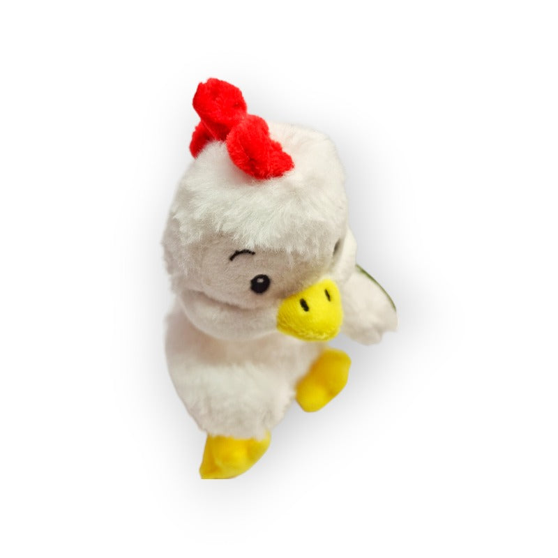 Fantastico peluche a forma di polletto di colore bianco con cresta rossa e dettagli gialli. Morbidissimo e tenerissimo, ottima idea regalo. Dimensione 16cm