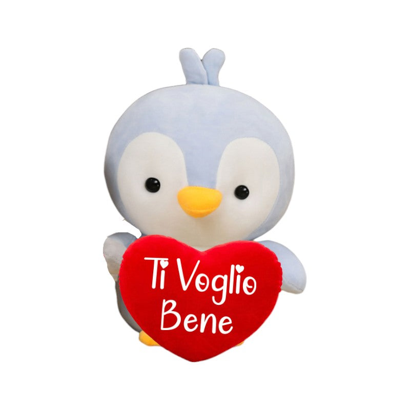 Bellissimo pupazzo per San Valentino a forma di tenerissimo pinguino con un cuscino a forma di cuore e la scritta "Ti Voglio Bene"