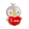 Bellissimo pupazzo per San Valentino a forma di tenerissimo pinguino con un cuscino a forma di cuore e la scritta "Ti Amo"