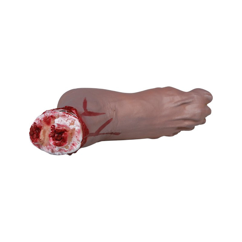 Piede mozzato finto di Halloween con effetto sangue realistico: decorazione horror per scherzi, feste a tema e case infestate. Su Viano Shop!