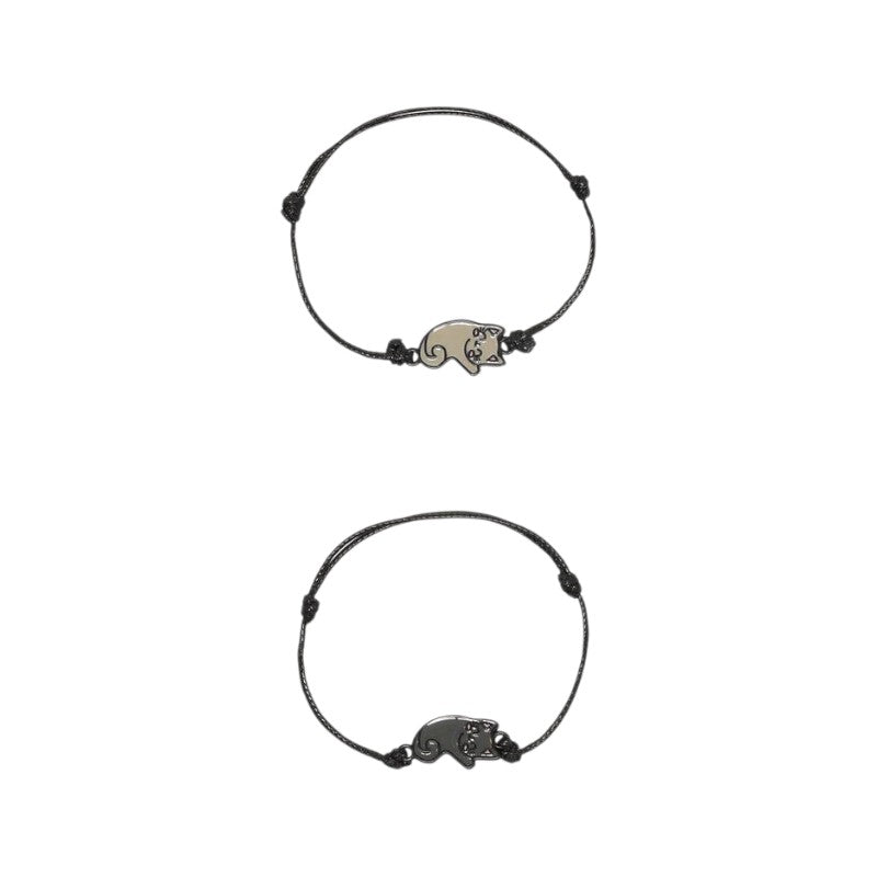 Set 2 braccialetti Legami Purrfect Match gatto: charm gattini beige e nero, cordino regolabile nero. Idea regalo amicizia! Scoprilo ora 