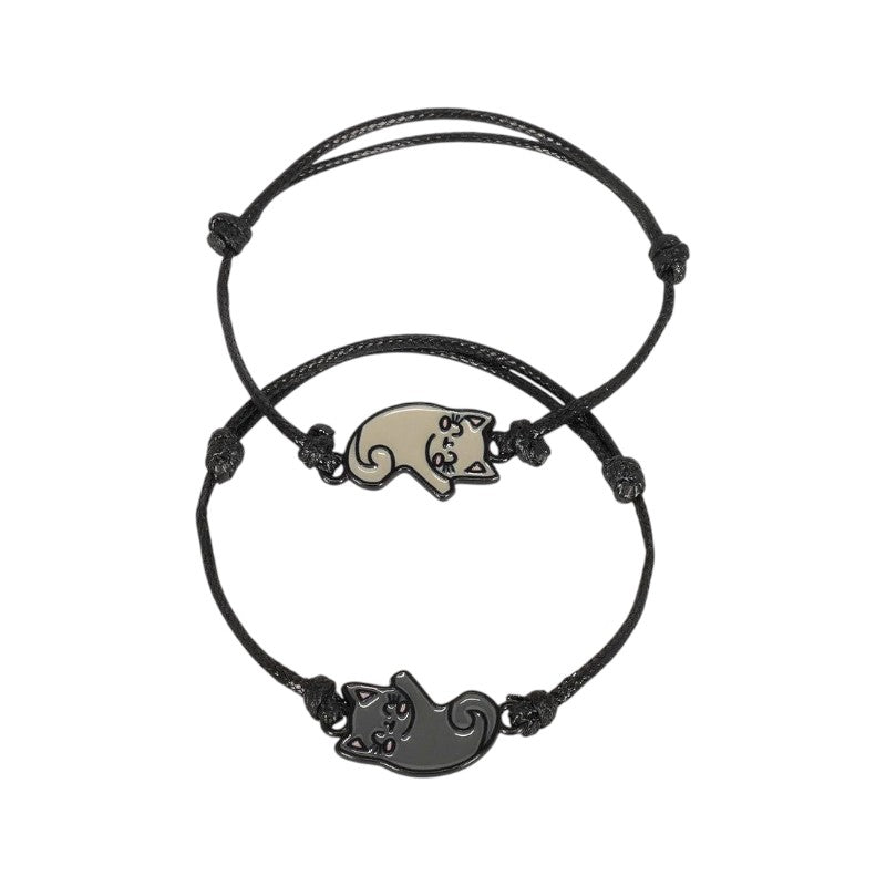 Set 2 braccialetti Legami Purrfect Match gatto: charm gattini beige e nero, cordino regolabile nero. Idea regalo amicizia! Scoprilo ora 