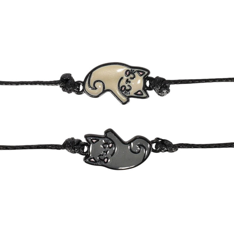 Set 2 braccialetti Legami Purrfect Match gatto: charm gattini beige e nero, cordino regolabile nero. Idea regalo amicizia! Scoprilo ora 