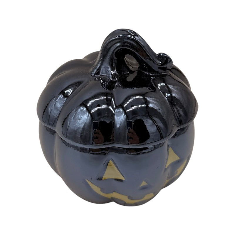 Barattolo zucca di Halloween nero lucido con coperchio e viso dorato: contenitore portacaramelle elegante e decorativo. Su Viano Shop!